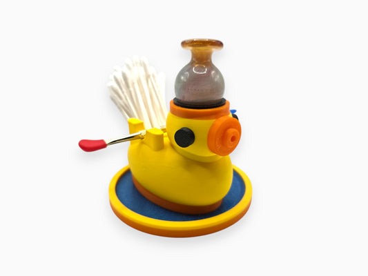 The Dabduck compact duck-shaped dab organizer with silicone carb cap holder